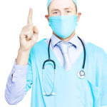 Health care professional pointing to copyspace